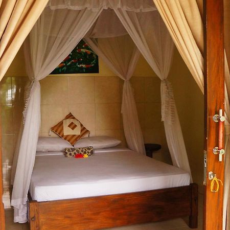 Rumahku Homestay อาเม็ด ภายนอก รูปภาพ