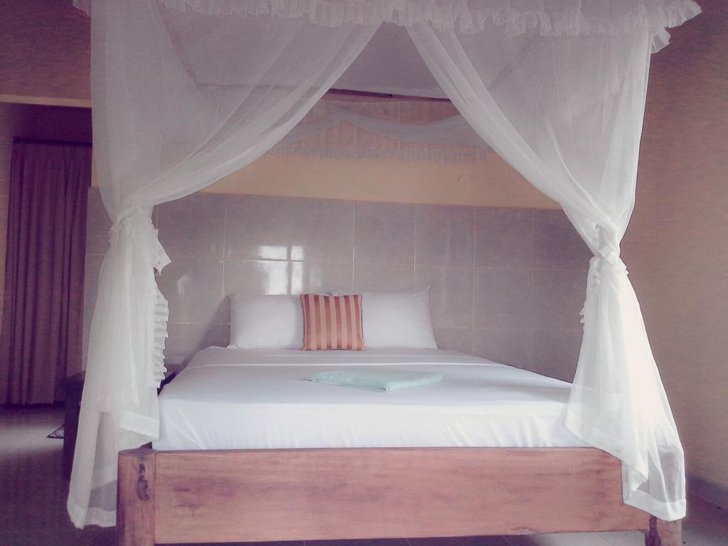 Rumahku Homestay อาเม็ด ห้อง รูปภาพ