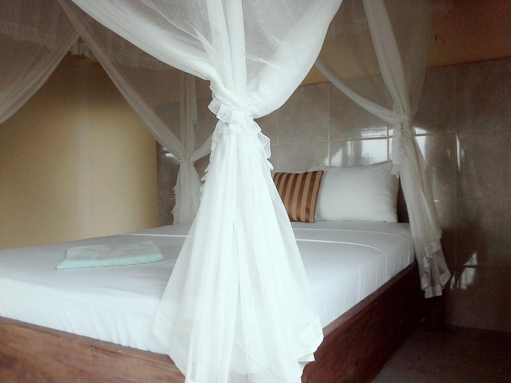 Rumahku Homestay อาเม็ด ห้อง รูปภาพ
