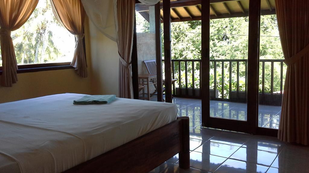 Rumahku Homestay อาเม็ด ภายนอก รูปภาพ