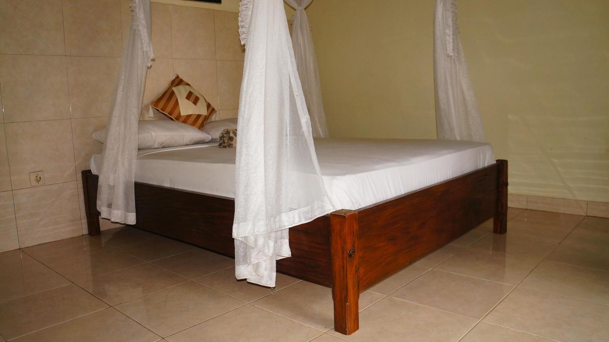Rumahku Homestay อาเม็ด ภายนอก รูปภาพ