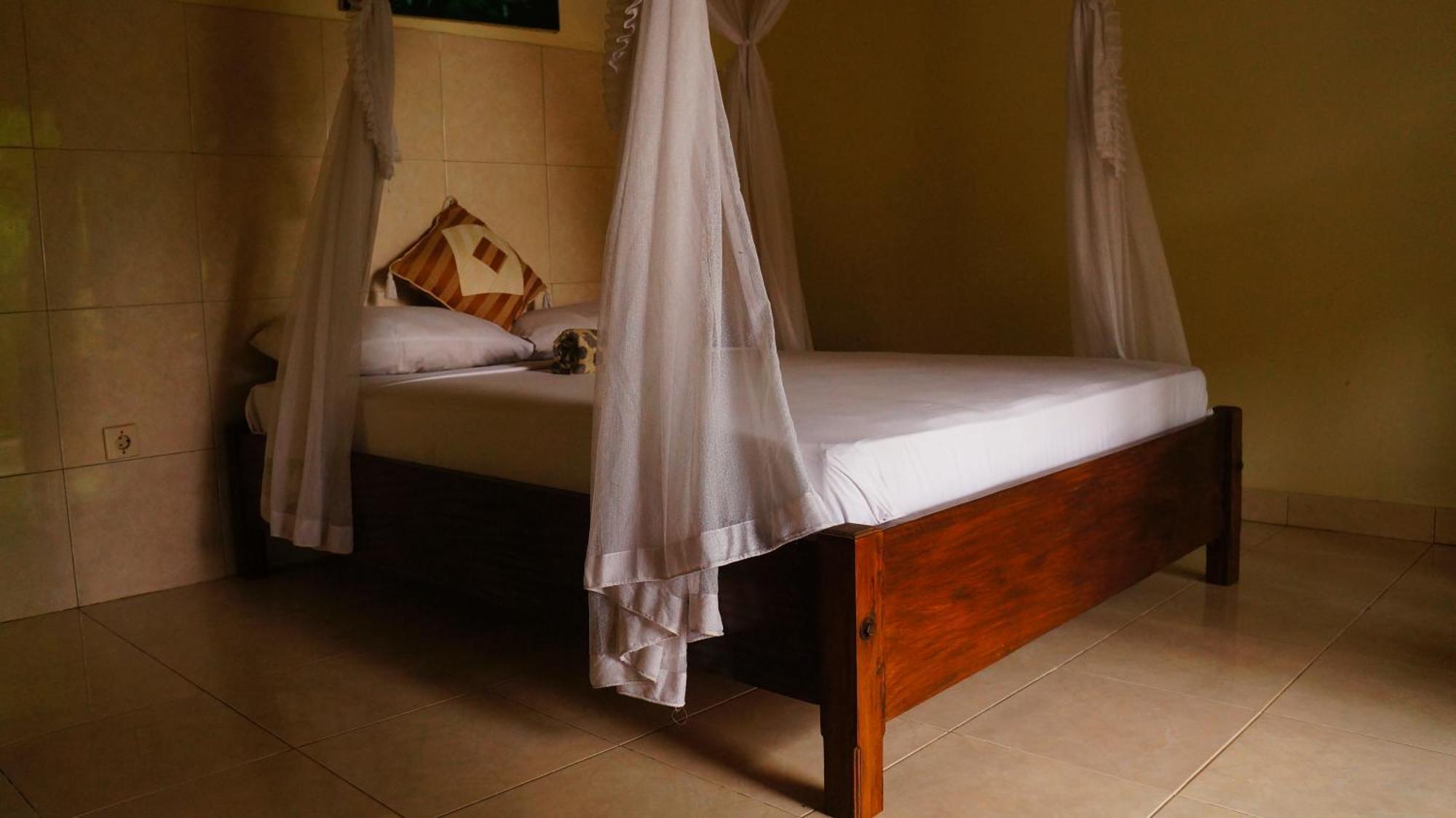 Rumahku Homestay อาเม็ด ภายนอก รูปภาพ