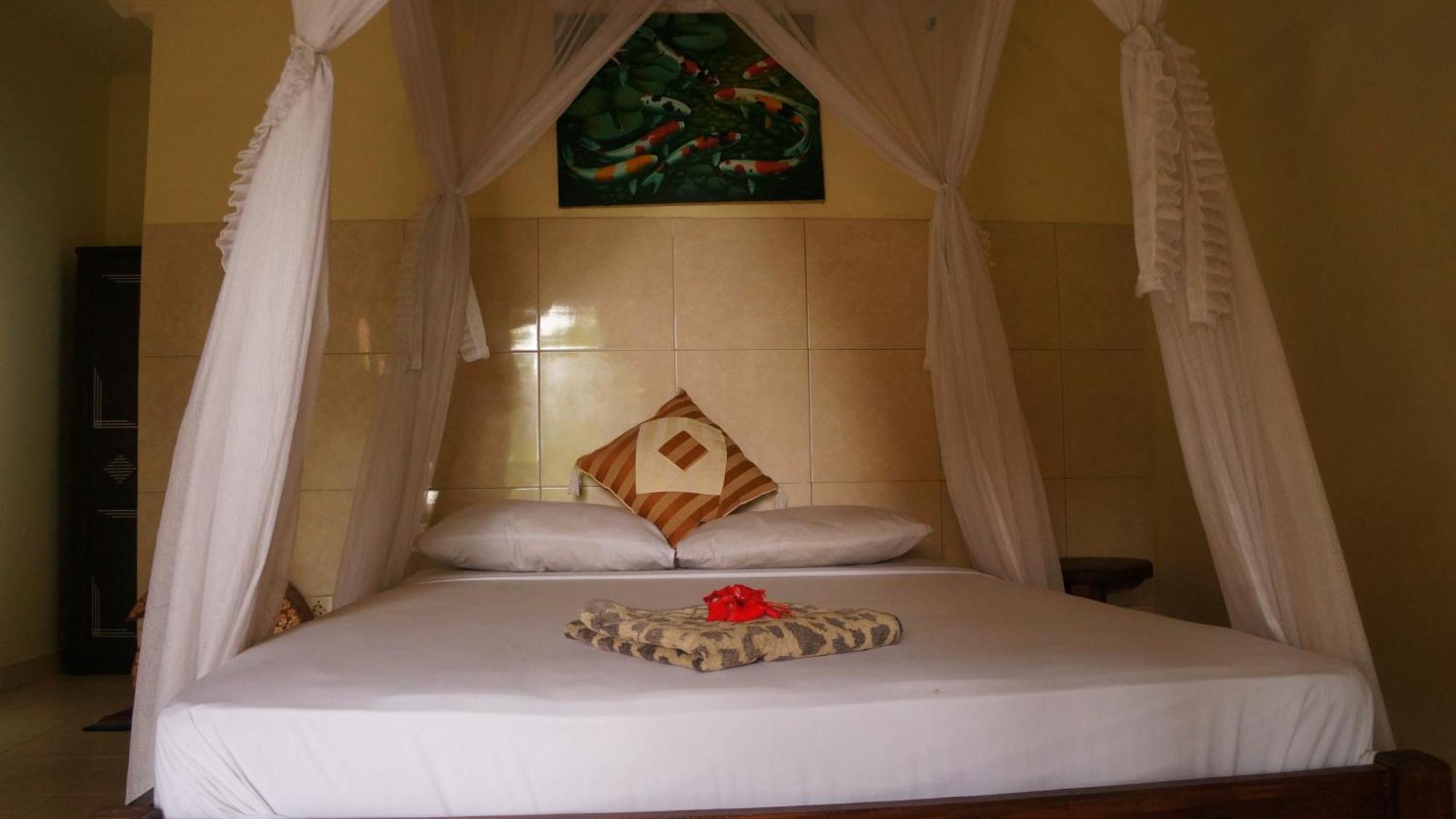 Rumahku Homestay อาเม็ด ภายนอก รูปภาพ