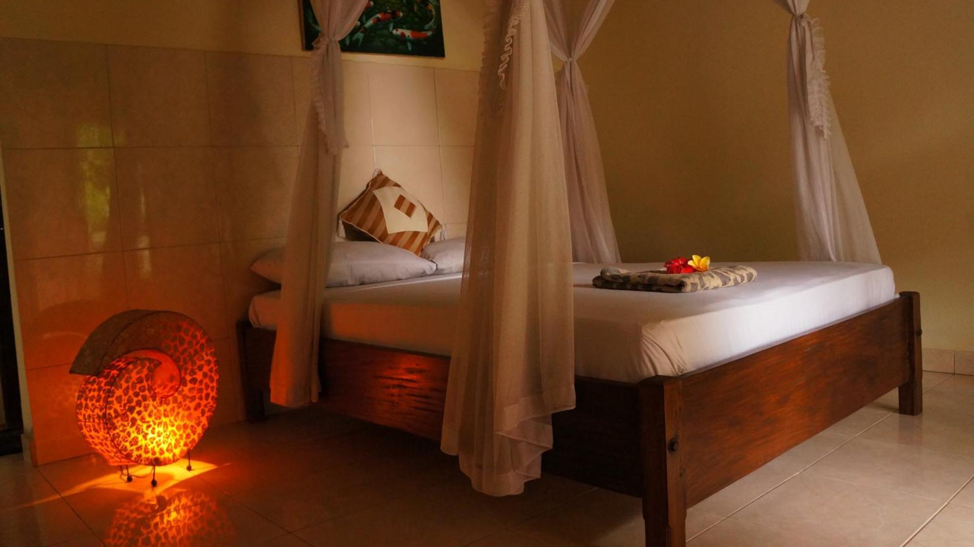 Rumahku Homestay อาเม็ด ภายนอก รูปภาพ