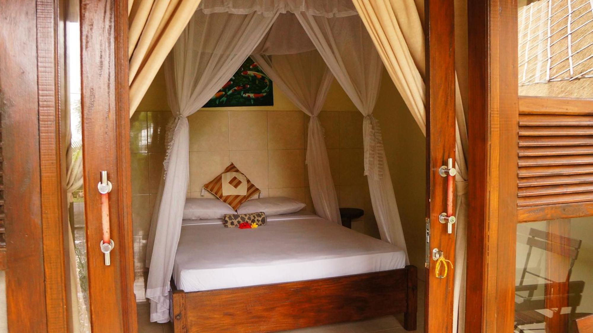 Rumahku Homestay อาเม็ด ภายนอก รูปภาพ