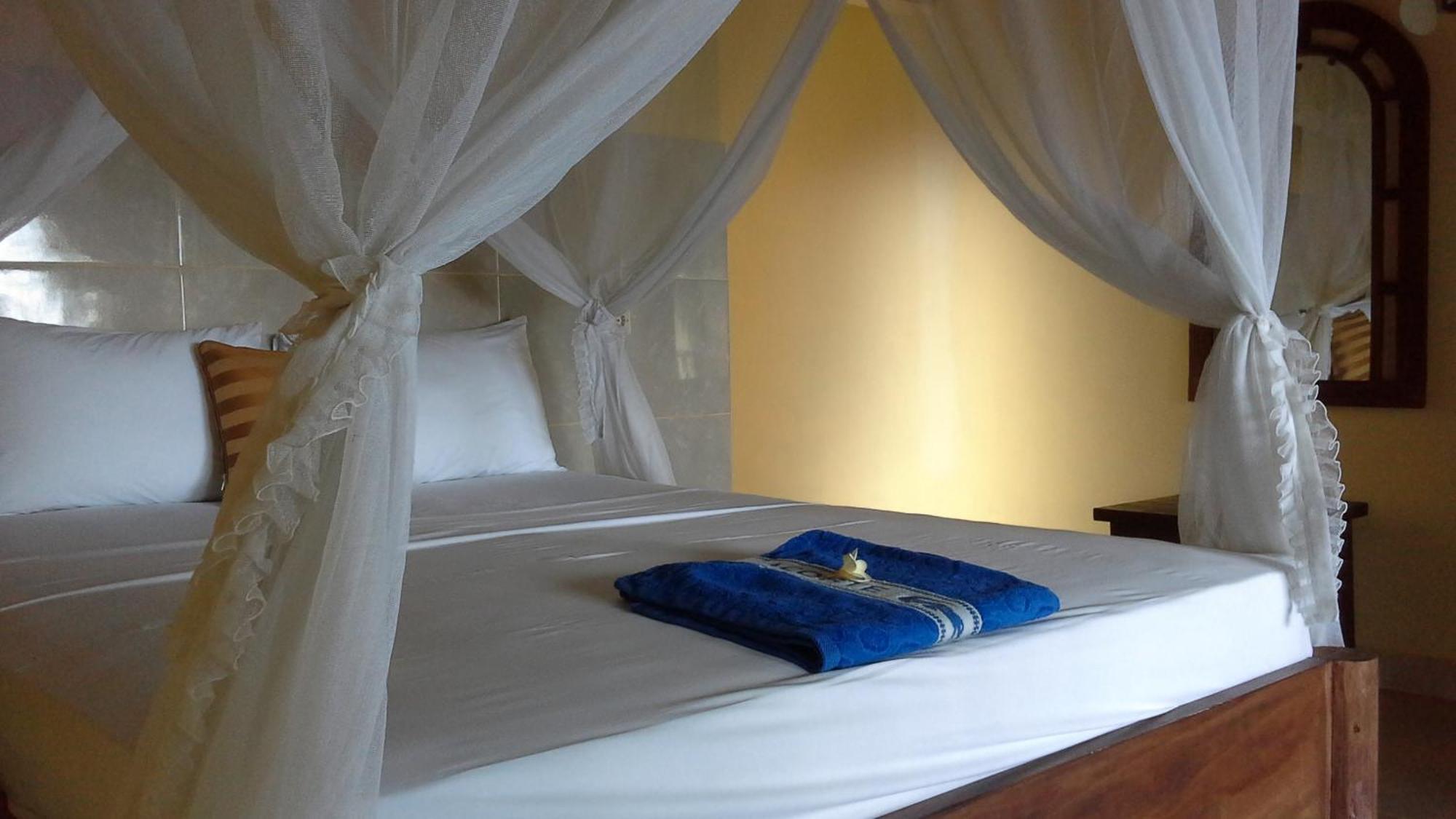 Rumahku Homestay อาเม็ด ห้อง รูปภาพ