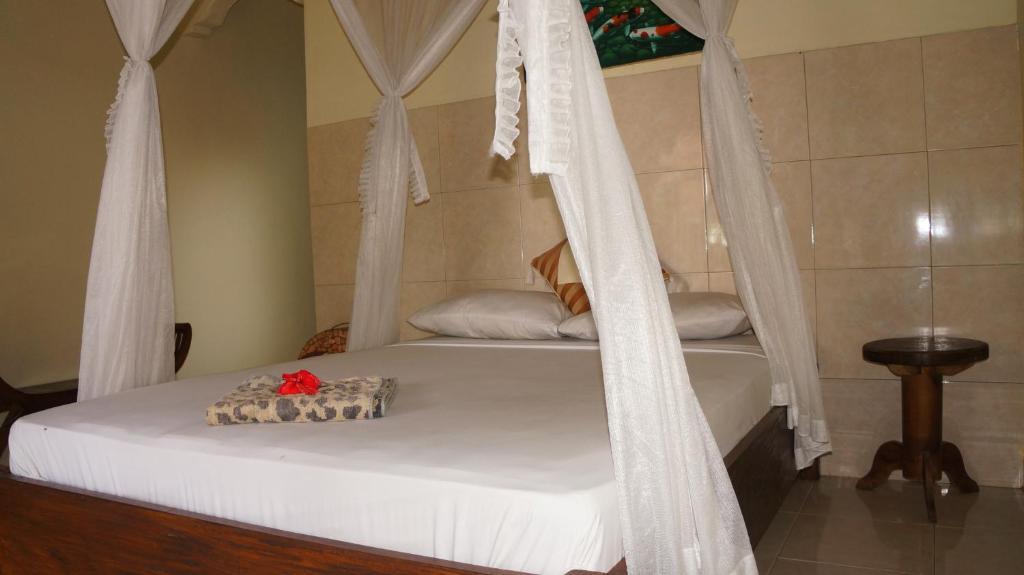 Rumahku Homestay อาเม็ด ภายนอก รูปภาพ